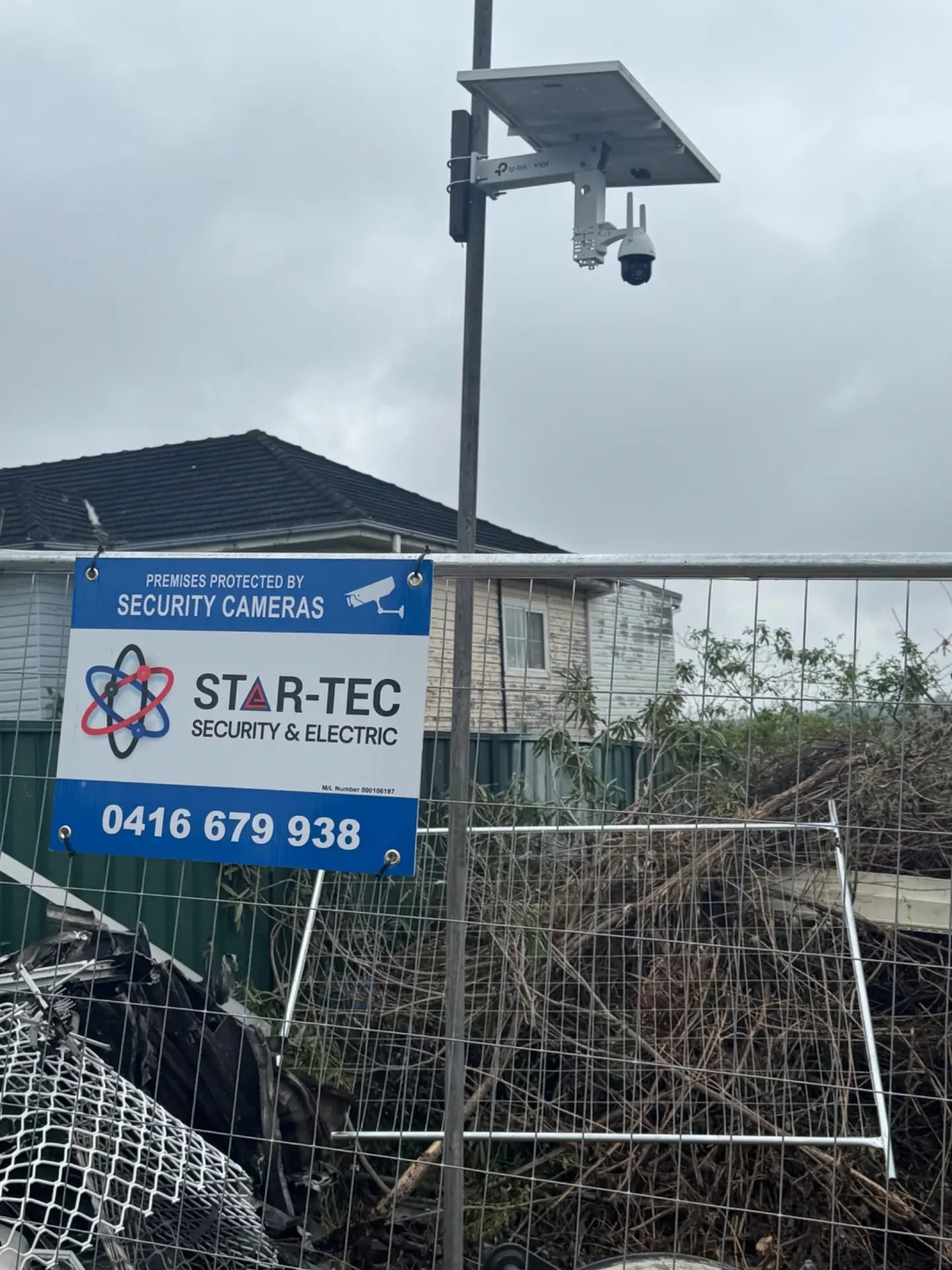 Monitored solar security camera at an active construction site